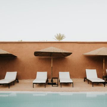 sun loungers by hotel pool, douba, morocco